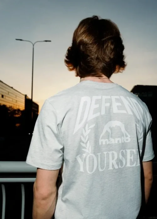 2025 Men's T-shirt Women's MANTO DEFEND Printed T-shirt 100% Pure Cotton Casual Fashion Short Sleeved T-shirt Street Sportswear